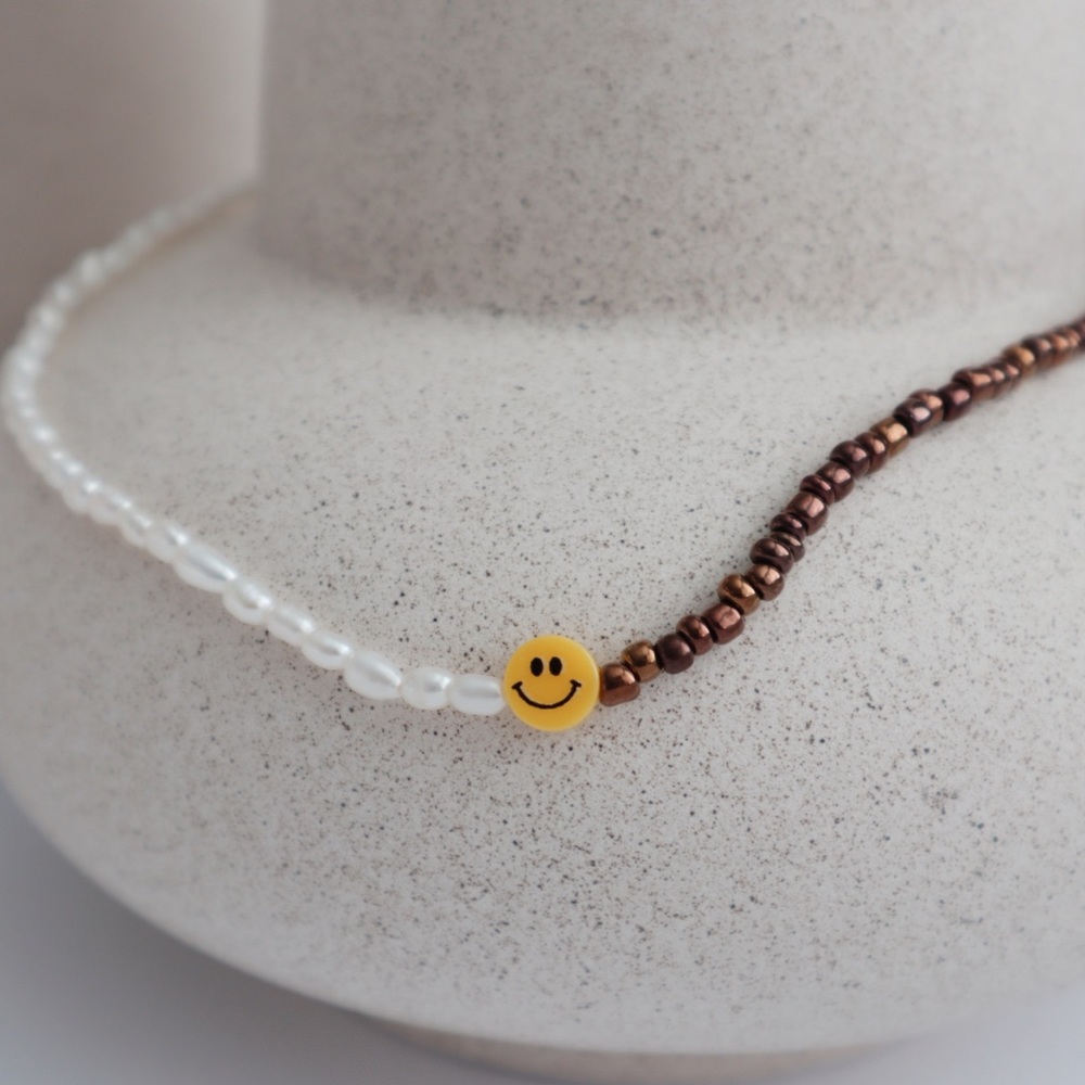 Beaded Necklace with pearls and metallic brown beads and yellow happy face